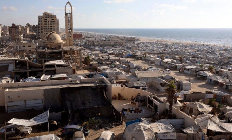 Displaced Palestinian families try to sustain their lives with severely limited resources inside an overcrowded makeshift tent camp set up along the Mediterranean coastline of Gaza City, Gaza, Palestine on June 22, 2026. [Ahmed Jihad Ibrahim Al-arini - Anadolu Agency]