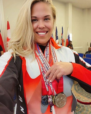 Picture of April Hutchinson with medals Picture of April Hutchinson with medals