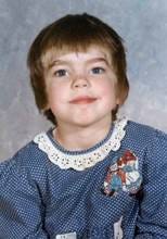 A close-up of a young child

AI-generated content may be incorrect.