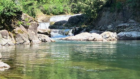 Waterfall, kayak in a lake, rapids along a river