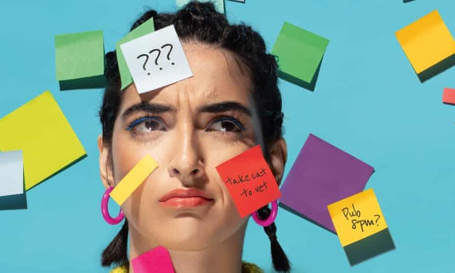 Woman with post-its stuck to her face