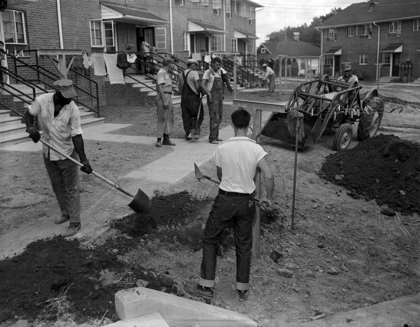 Men landscaping Few Gardens. Men landscaping Few Gardens.