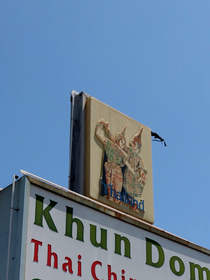 Various vacuum form signs around Long Beach