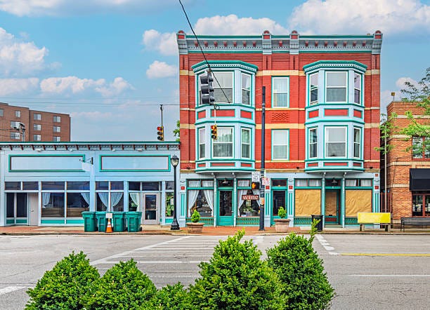 Window shopping through multilevel rural downtowns reveals charming storefronts with unique architectural styles. Storefronts line the main road in Mason, Ohio, creating a charming and welcoming streetscape. A pedestrian crosswalk extends to the edge of the row of local shops, offering safe and convenient access for visitors exploring the area. reTAIL STORE BUILDING stock pictures, royalty-free photos & images Window shopping through multilevel rural downtowns reveals charming storefronts with unique architectural styles. Storefronts line the main road in Mason, Ohio, creating a charming and welcoming streetscape. A pedestrian crosswalk extends to the edge of the row of local shops, offering safe and convenient access for visitors exploring the area. reTAIL STORE BUILDING stock pictures, royalty-free photos & images