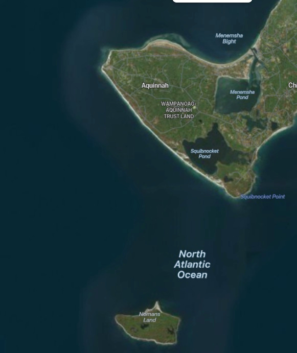 Satellite image of the southwest tip of Martha's Vineyard, including Squibnocket Point. Three miles away is the small island of Nomans. The words "North Atlantic Ocean" appear on the image between the two islands. Satellite image of the southwest tip of Martha's Vineyard, including Squibnocket Point. Three miles away is the small island of Nomans. The words "North Atlantic Ocean" appear on the image between the two islands.
