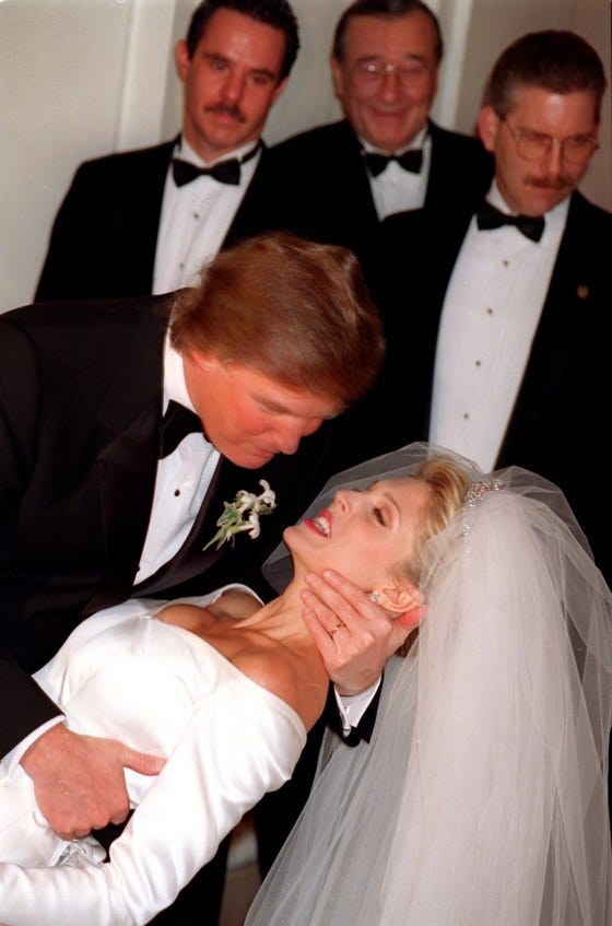 Donald Trump sweeps his bride, Marla Maples, off her feet for a kiss after their wedding ceremony at New York's Plaza Hotel, December 20, 1992. Donald Trump sweeps his bride, Marla Maples, off her feet for a kiss after their wedding ceremony at New York's Plaza Hotel, December 20, 1992.