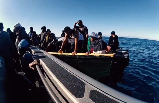 The 64 illegal aliens were taken into custody & transferred to CBP & Puerto Rican Police boats for safe transport to Mayaguez. (US Customs & Border Protection image) The 64 illegal aliens were taken into custody & transferred to CBP & Puerto Rican Police boats for safe transport to Mayaguez. (US Customs & Border Protection image)