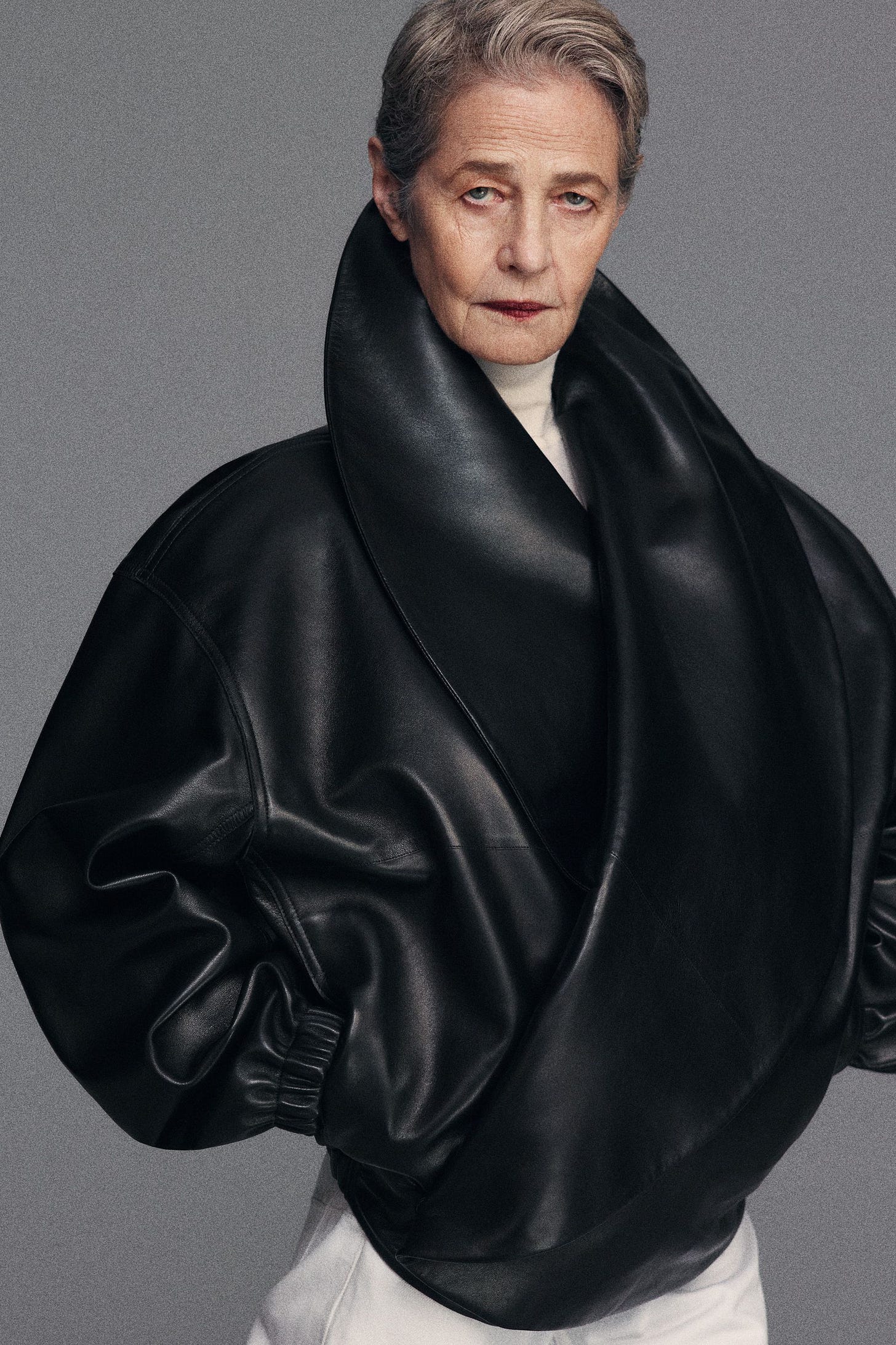 Image may contain Charlotte Rampling Clothing Coat and Jacket