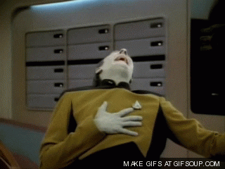 Data from Star Trek: TNG laughing uproariously and eventually stopping by making a straight face to show he wasn't actually laughing at all