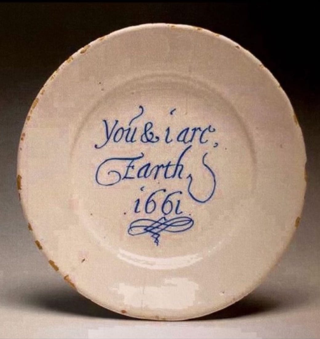 17th century earthenware plate with blue script that reads, "You & I Are Earth, 1661." 17th century earthenware plate with blue script that reads, "You & I Are Earth, 1661."