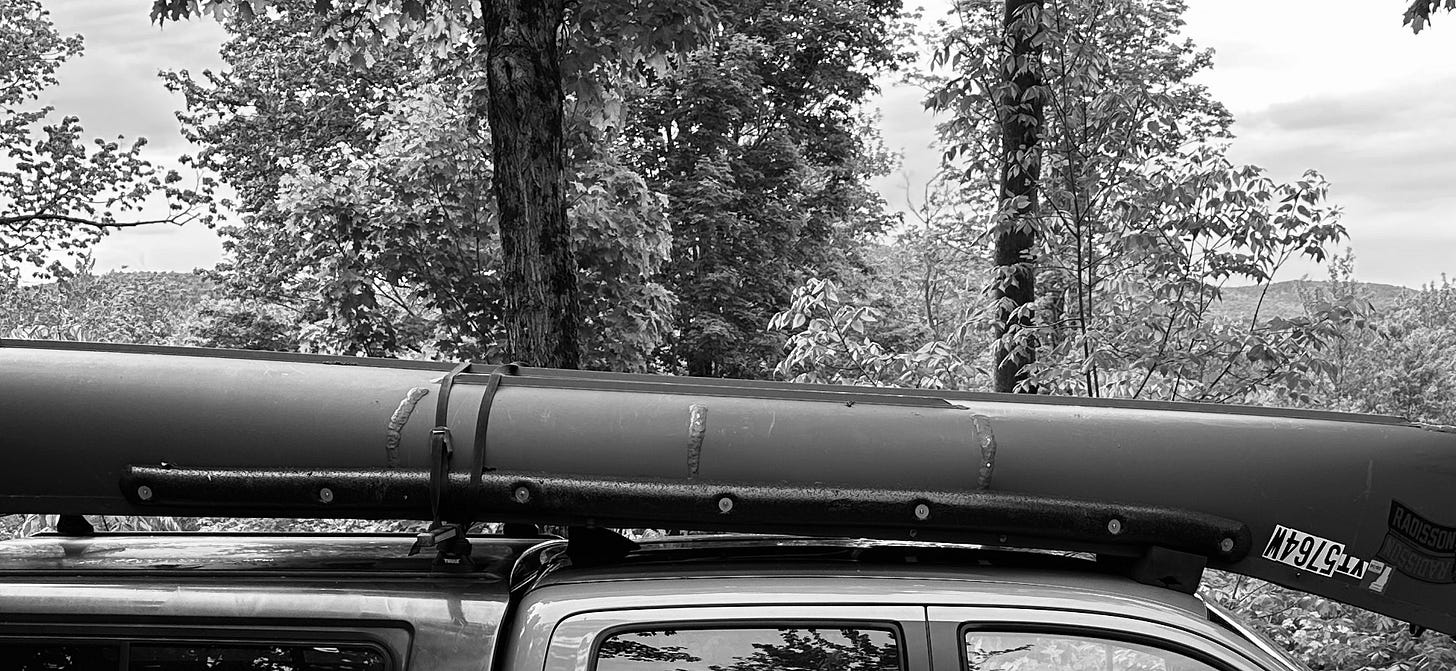 A canoe on top of Jesse McEntee's truck