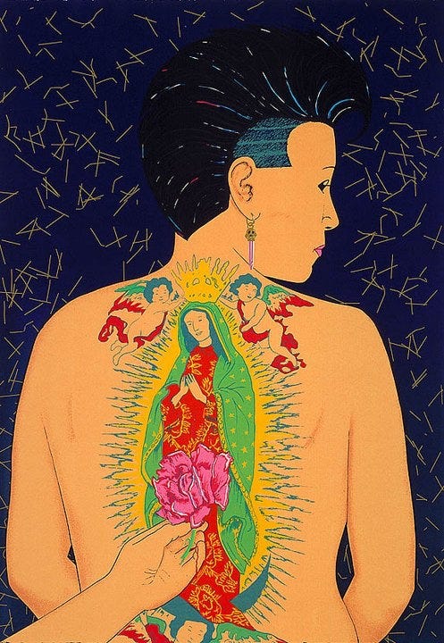 A masc butch with short shaved hair on the sides and long on the top shows us her naked back tattooed with the Virgin de Guadalupe. She looks over one shoulder. A hand holds a rose to the middle of her back, as an offering. A masc butch with short shaved hair on the sides and long on the top shows us her naked back tattooed with the Virgin de Guadalupe. She looks over one shoulder. A hand holds a rose to the middle of her back, as an offering.