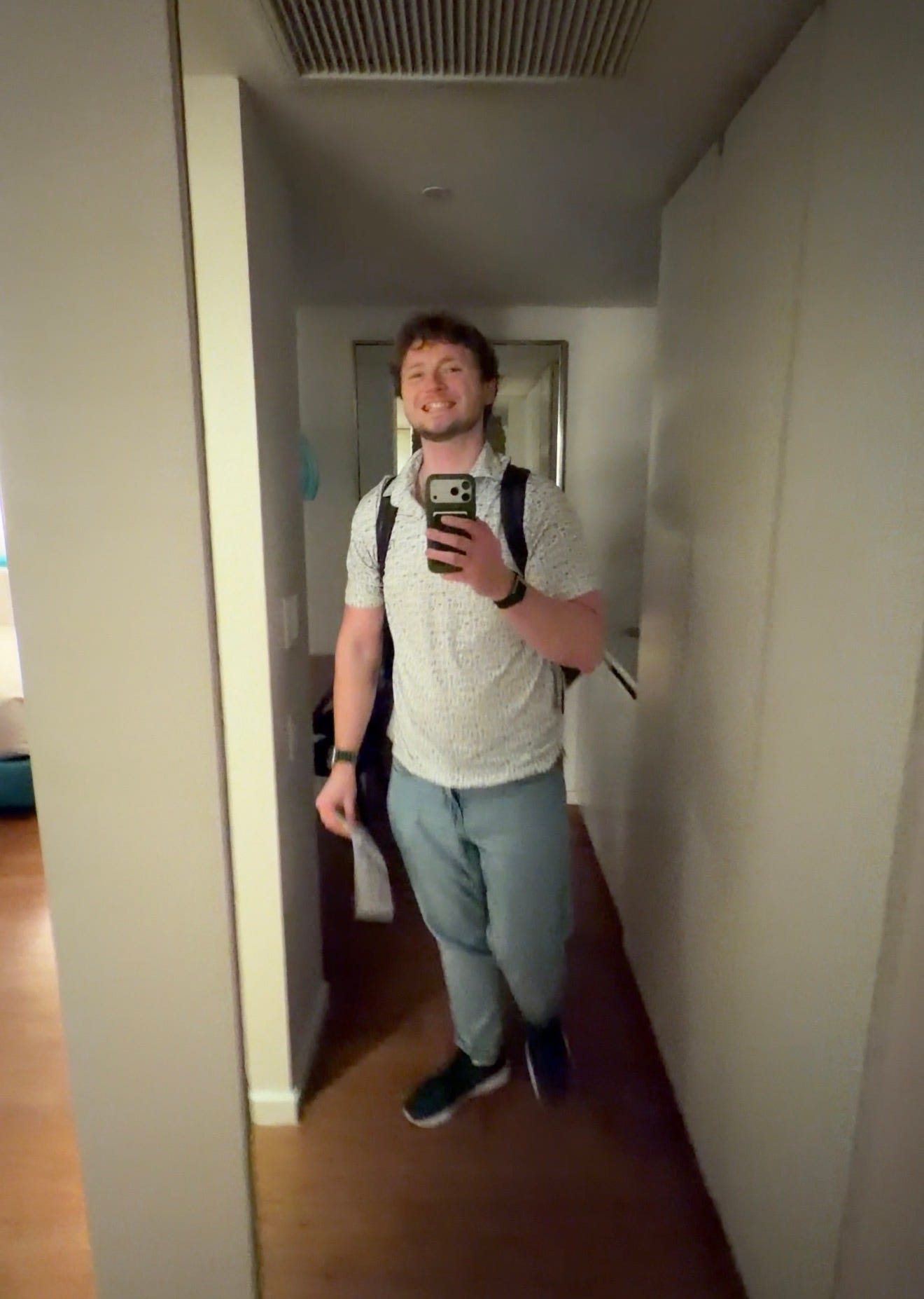 max with an iphone 17 pro max and green finewoven case