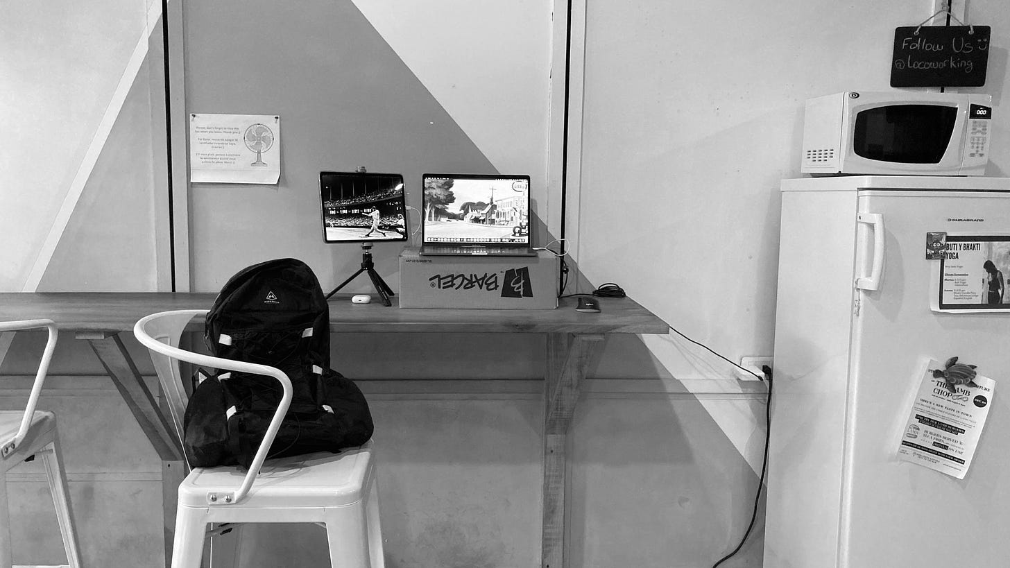Laptop and backpack in a coworking space. Laptop and backpack in a coworking space.