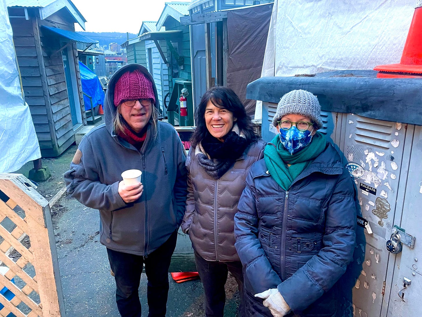 May be an image of 3 people, people standing and outdoors