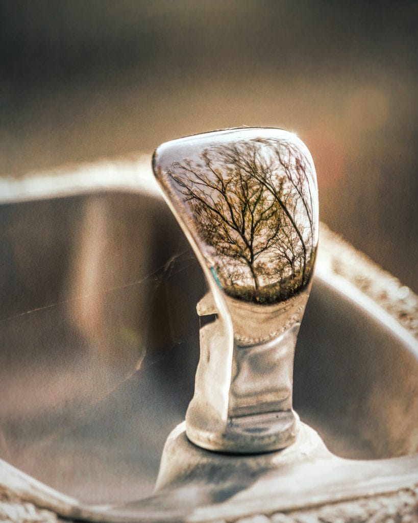 reflections in a water fountain