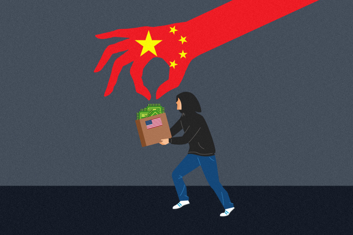 Illustration of a large hand representing China taking US microchips.