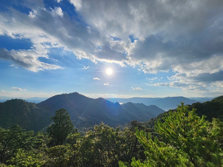 Mt. Misen (left); Mt. Hiei and Lake Biwa (right)