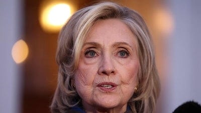 Former US Secretary of State Hillary Clinton speaks to the press after her a deposition with the House Oversight Committee as they investigate links to convicted sex offender Jeffrey Epstein, in Chappaqua, New York. (AFP)