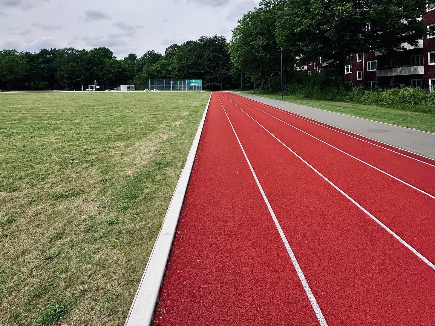 An empty running track on a quiet day, ready for a run. An empty running track on a quiet day, ready for a run.