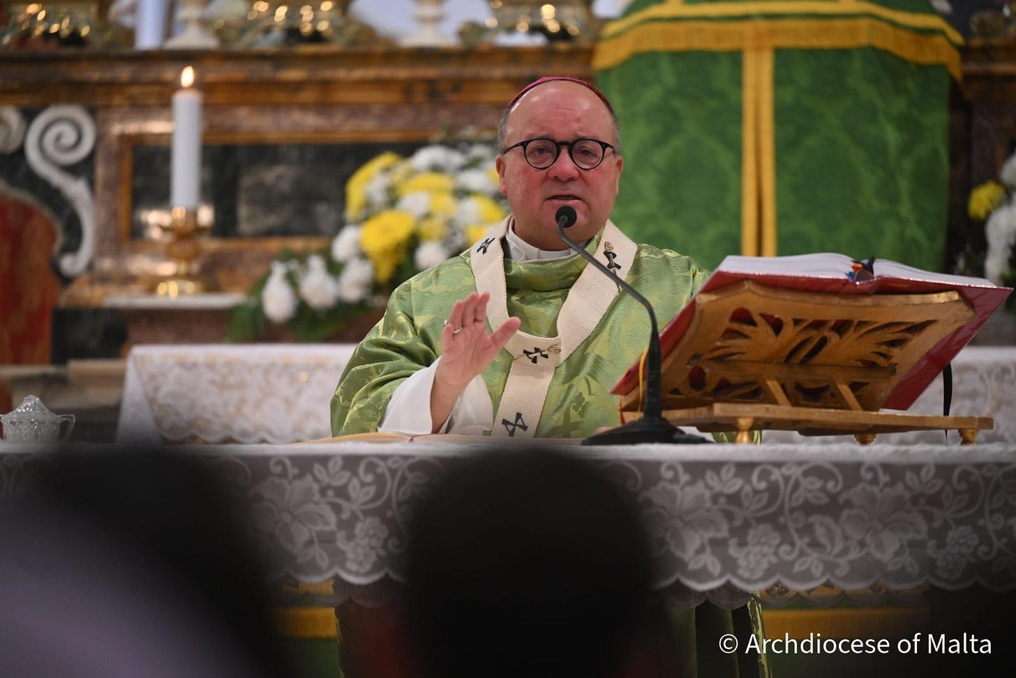 May be an image of text that says "4 女場 Archdiocese ArchdioceseofMalta of Malta"