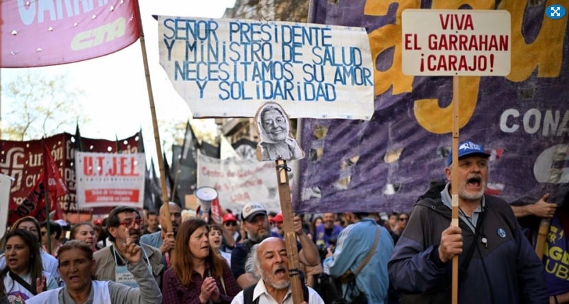 A group of people holding signs
AI-generated content may be incorrect. A group of people holding signs
AI-generated content may be incorrect.