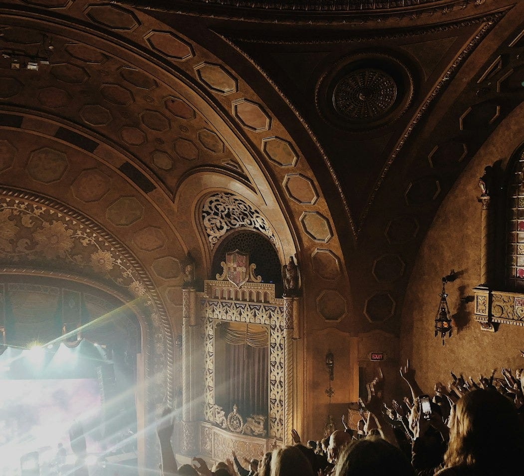 a large crowd of people in a building
