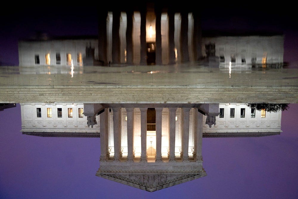 The Supreme Court building appears upside down.