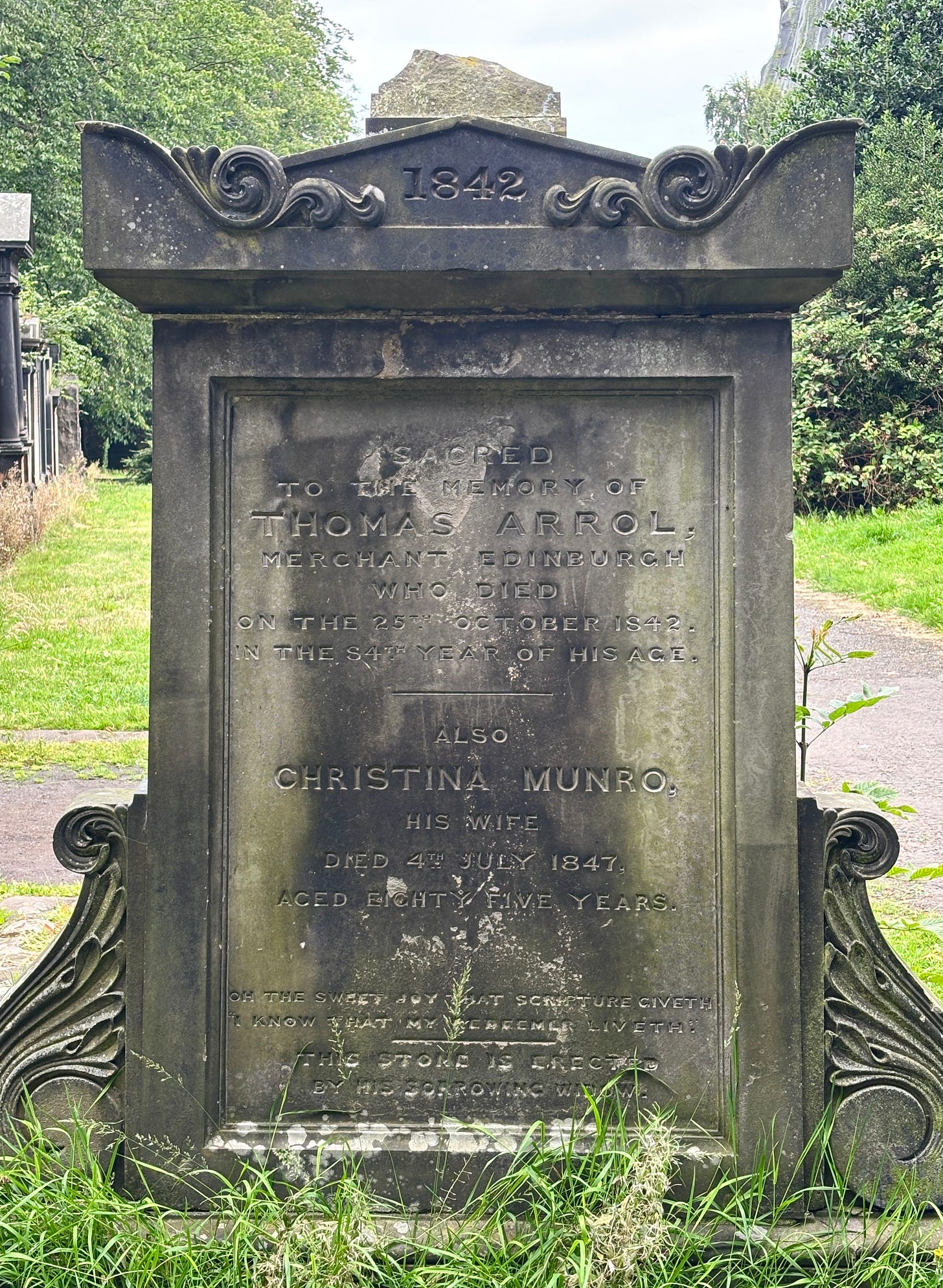 An old gravestone from 1842 commemorating Thomas Arrol, a merchant from Edinburgh, and his wife, Christina Munro. Notably, the husband and wife are listed with different surnames, reflecting historical naming practices where women often retained their maiden names. An old gravestone from 1842 commemorating Thomas Arrol, a merchant from Edinburgh, and his wife, Christina Munro. Notably, the husband and wife are listed with different surnames, reflecting historical naming practices where women often retained their maiden names.