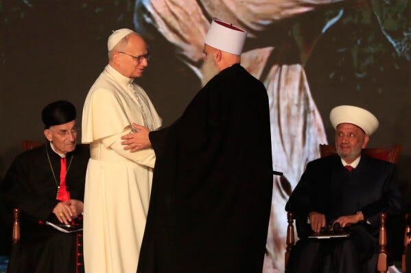 Pope Leo XIV greets a Druze sheikh as he attends an ecumenical and interreligious meeting at Martyrs' Square in downtown Beirut, Lebanon, Monday, Dec. 1, 2025. (AP Photo/Mohammad Zaatari) Pope Leo XIV greets a Druze sheikh as he attends an ecumenical and interreligious meeting at Martyrs' Square in downtown Beirut, Lebanon, Monday, Dec. 1, 2025. (AP Photo/Mohammad Zaatari)