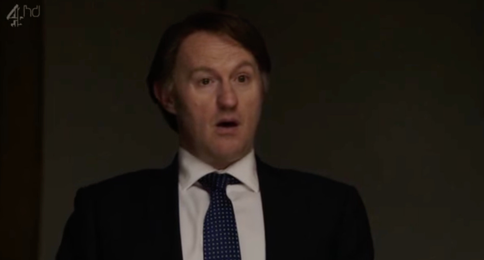 A person in a suit and tie

AI-generated content may be incorrect.