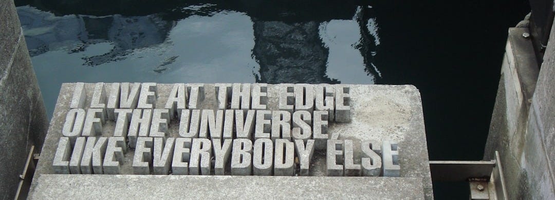 a sign that reads live at the edge of the university like everybody else a sign that reads live at the edge of the university like everybody else