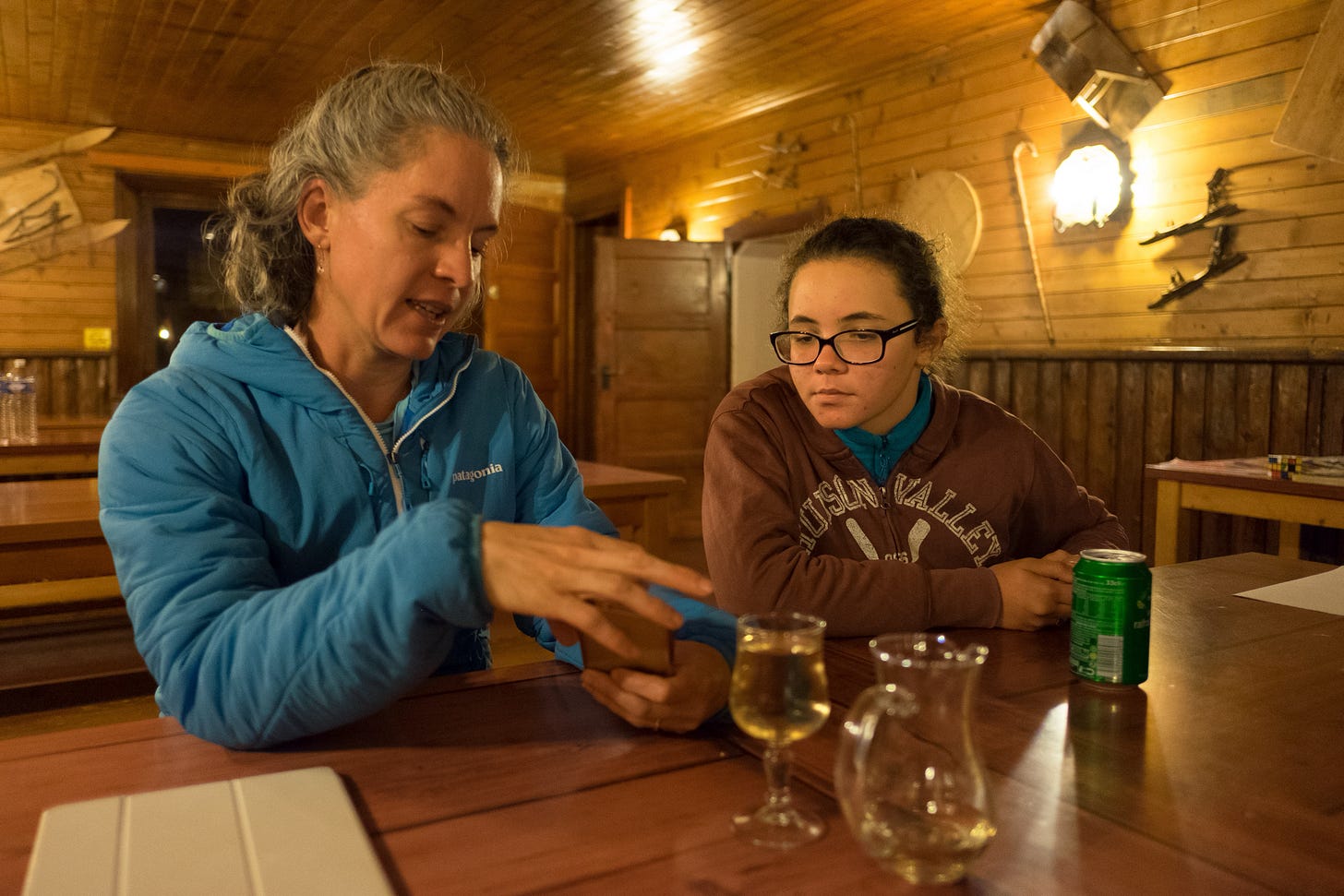 Showing pictures of my own kids to my new friend.