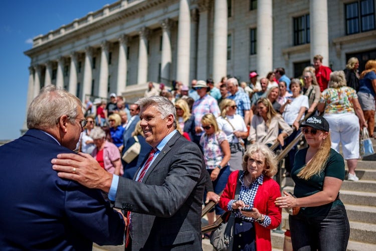 (Trent Nelson  |  The Salt Lake Tribune) Phil Lyman with supporters after announcing a lawsuit to gain access to Utah voting records at a news conference at the Utah Capitol in Salt Lake City on Friday, June 6, 2025.