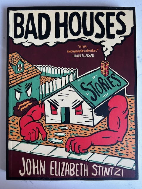 A drawing of a house with muscular red arms. Out of the chimney is smoke where the title appears.