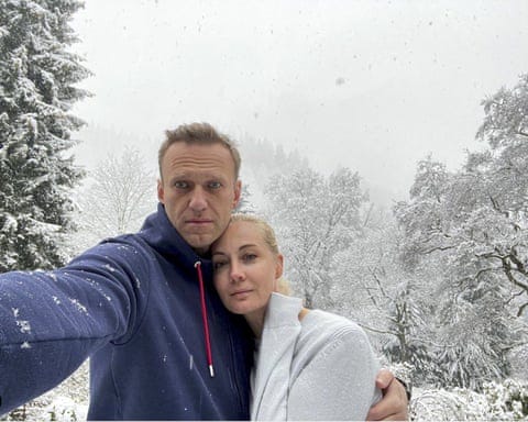 A selfie of Alexei Navalny and wife, Yulia, in snow-covered woodland