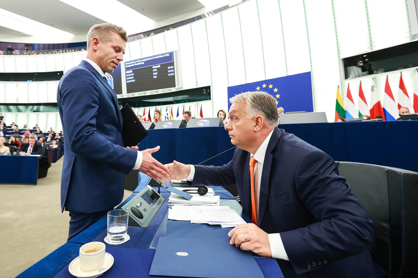 Péter Magyar greets Viktor Orbán during a European Parliament session in Strasbourg, October 9, 2024. Péter Magyar greets Viktor Orbán during a European Parliament session in Strasbourg, October 9, 2024.