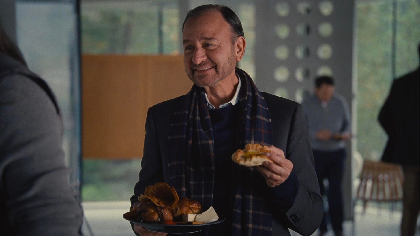 Hugo eating pastries.
