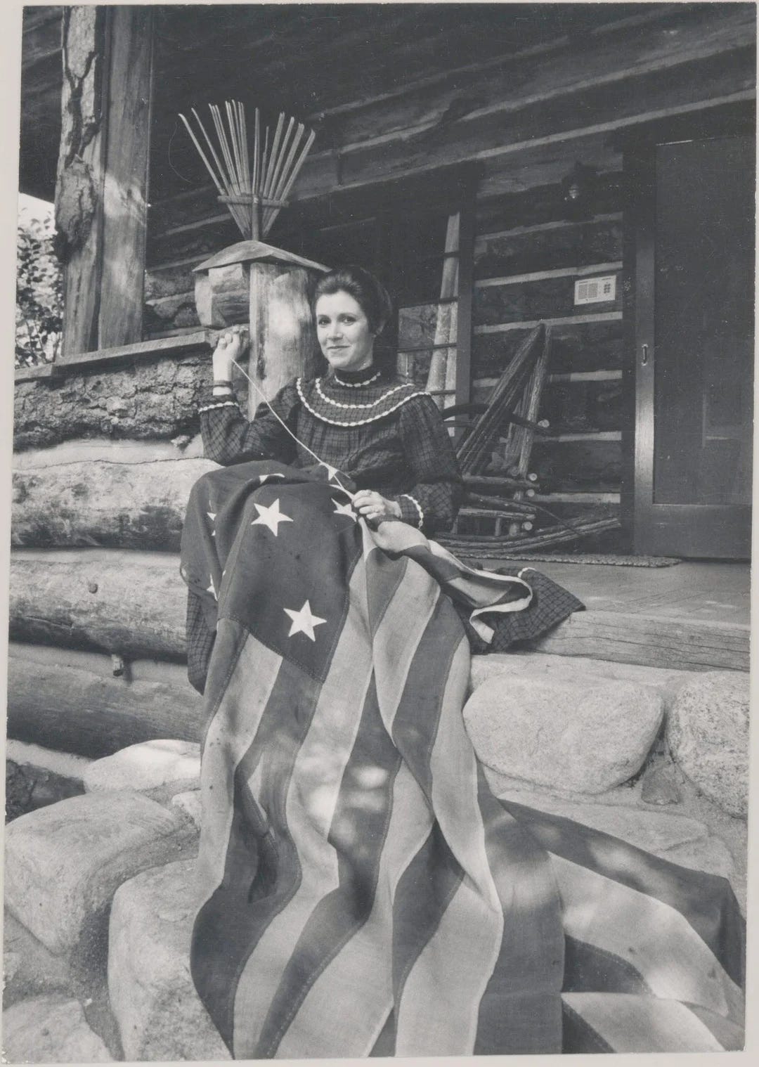 Smithsonian portrait of Carrie Fisher sewing American flag at home, Los ...