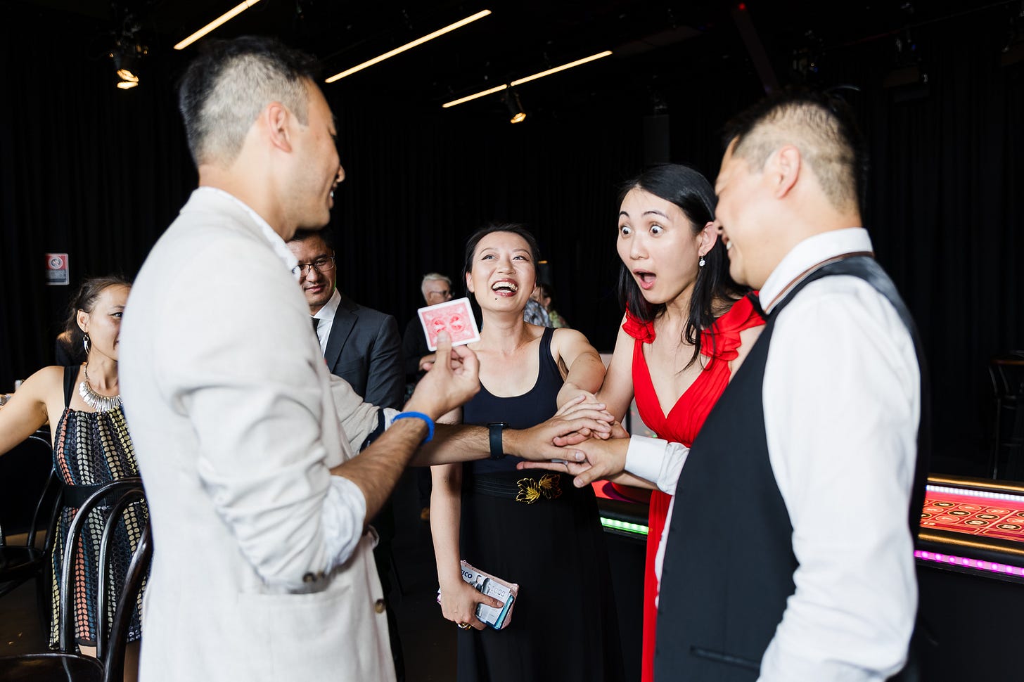 David Ung performing magic at a corporate Christmas party