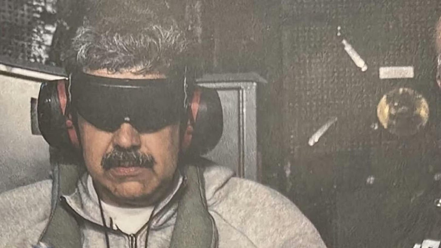 US President Donald Trump posted this photo of Nicolas Maduro aboard the USS Iwo Jima on Truth Social. Madruo is wearing large noise-blocking headphones and a blindfold.