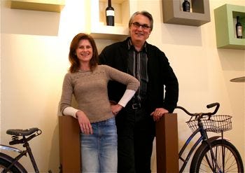 Acme - Karen & David between bicycles Acme - Karen & David between bicycles