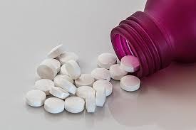 Royalty-Free photo: Pills in bottle | PickPik