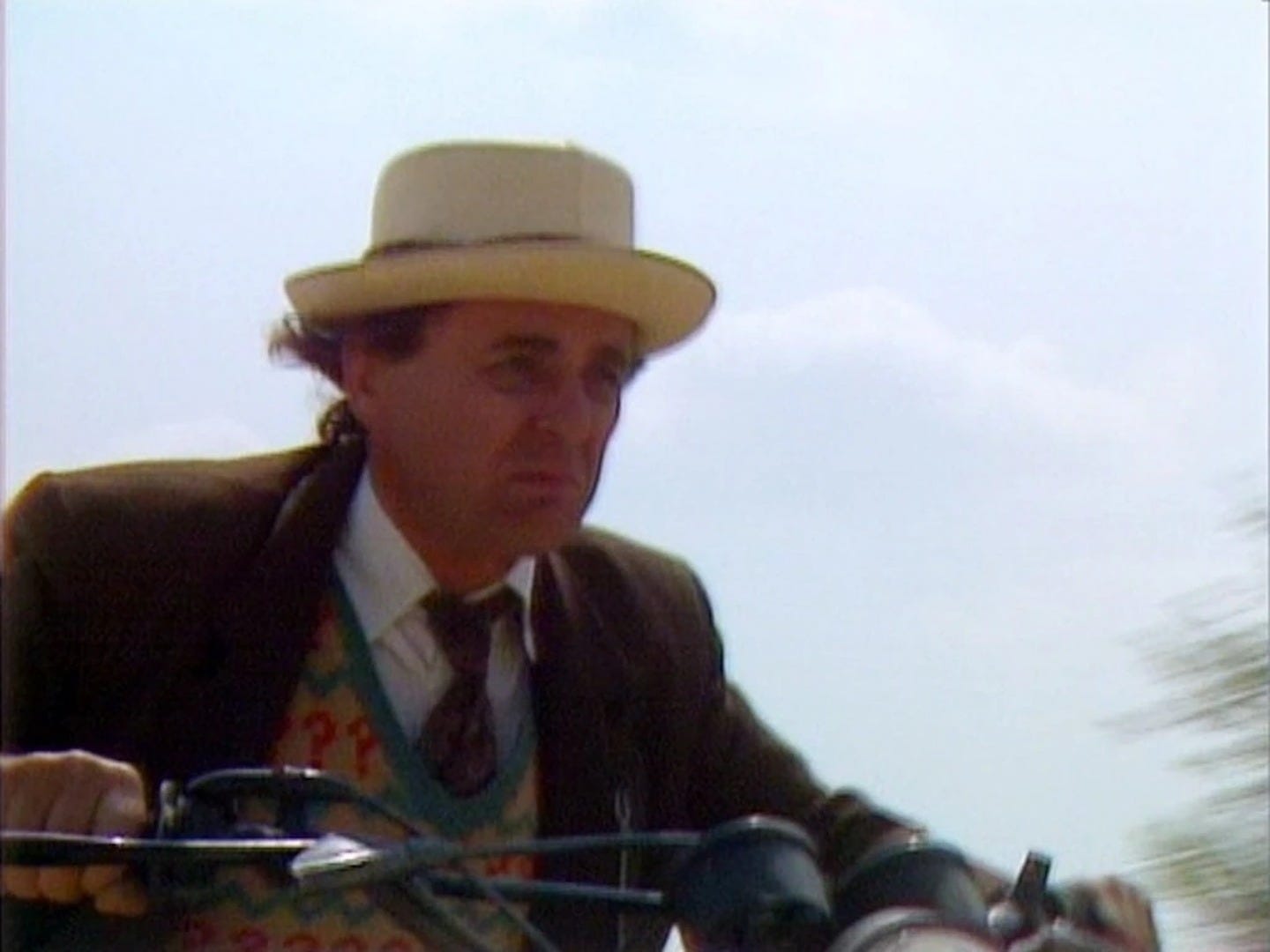 The Doctor on a motorbike for the joust with Midge The Doctor on a motorbike for the joust with Midge