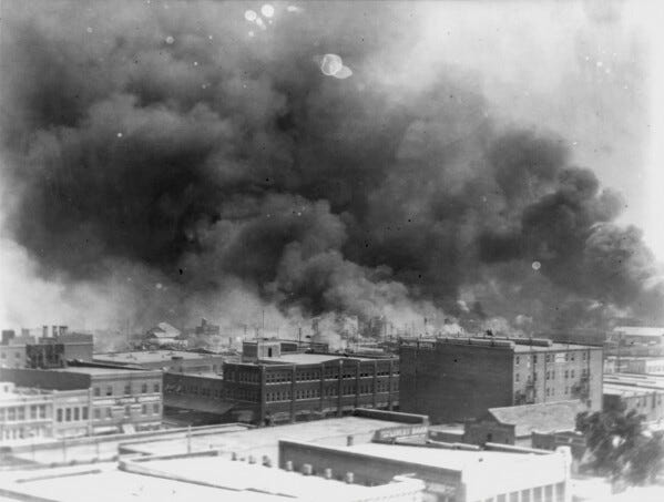 In this 1921 image provided by the Library of Congress, smoke billows over Tulsa, Okla. An Oklahoma judge has thrown out a lawsuit seeking reparations for the 1921 Tulsa Race Massacre, dashing an effort to obtain some measure of legal justice by survivors of the deadly racist rampage. (Alvin C. Krupnick Co./Library of Congress via AP) In this 1921 image provided by the Library of Congress, smoke billows over Tulsa, Okla. An Oklahoma judge has thrown out a lawsuit seeking reparations for the 1921 Tulsa Race Massacre, dashing an effort to obtain some measure of legal justice by survivors of the deadly racist rampage. (Alvin C. Krupnick Co./Library of Congress via AP)