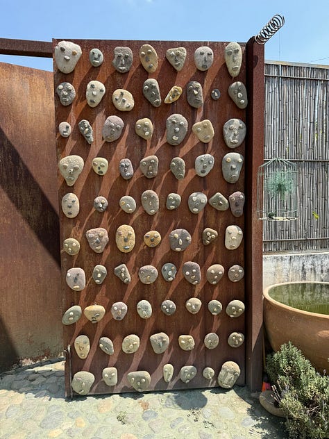 Nine images of sculpture placed within the cactus garden Vives Verde.