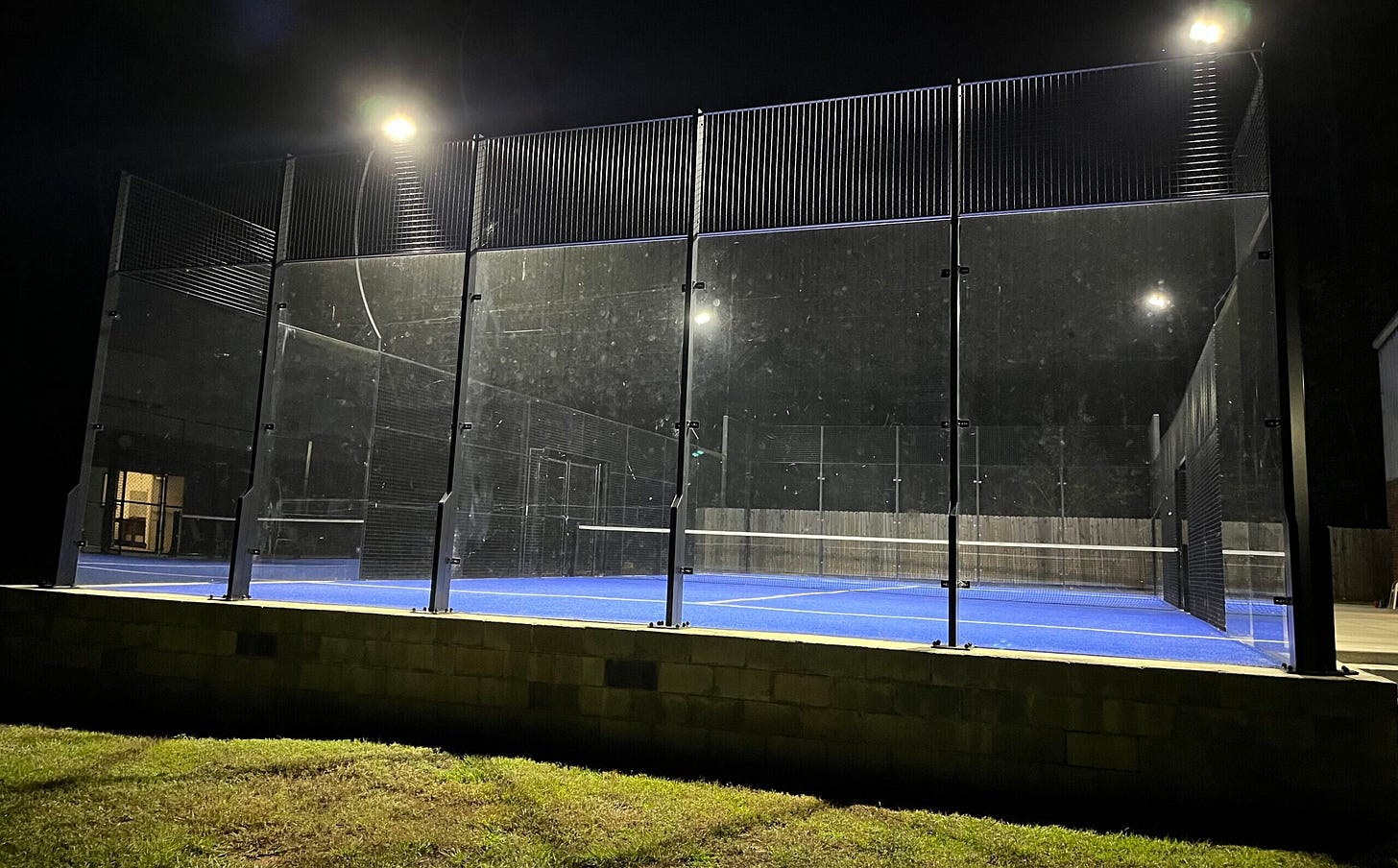 Padel court at night at Columbia Racquet Club