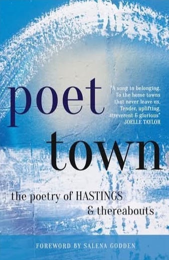 The image is a book cover. A variation of blues reflecting the sky, the sea and waves with white brushstrokes curving across the top half. The text reads: Poet Town – the poetry of Hastings and thereabouts. Foreword by Selena Godden. With the quote ‘A song to belong in. To the hometowns that never leave us. Tender, uplifting, irreverent and glorious.’ Joelle Taylor.