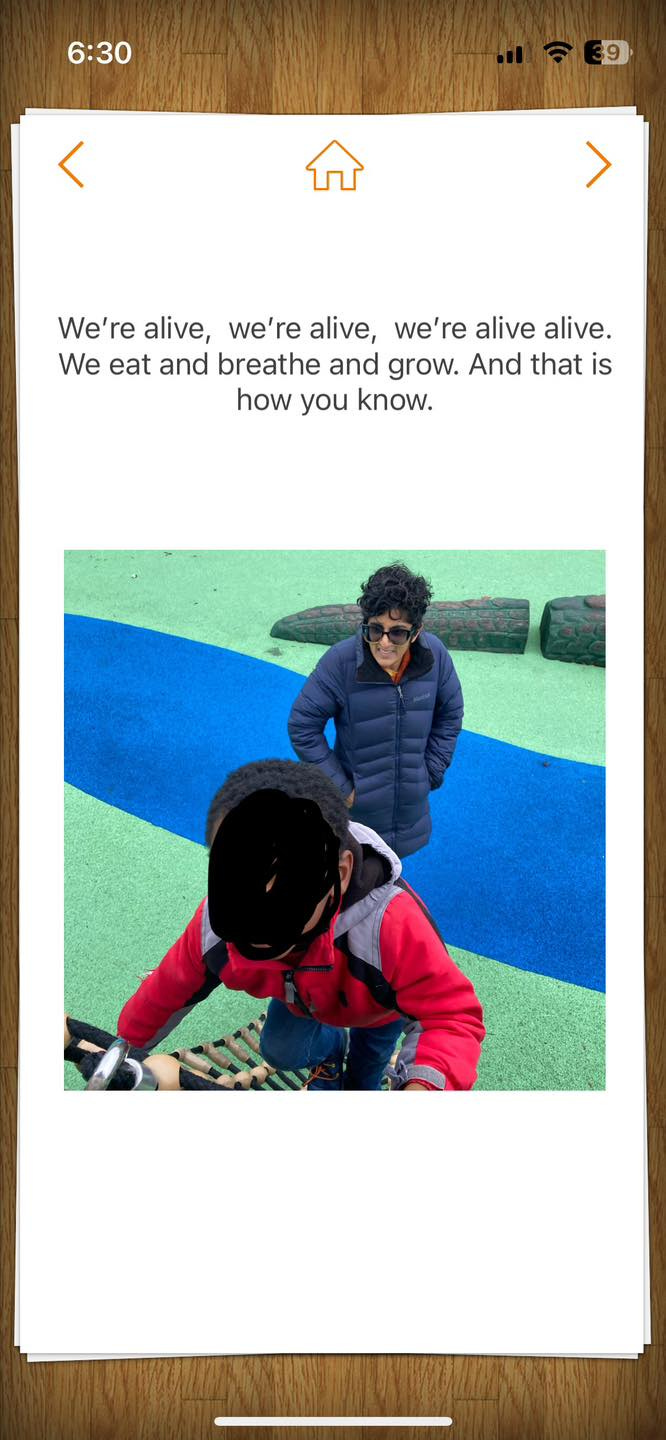 May be an image of 2 people, phone and text