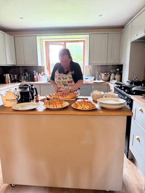 2025-6-21 Hazel prepping lunch at Miller Farm Lake District England, photo by Tanya Briley